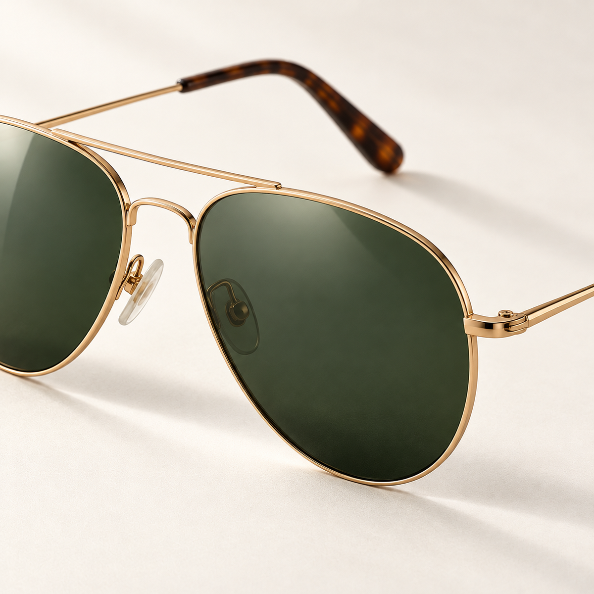 Shadevera Solace Aviator sunglasses, warm gold frame and forest green lenses, detail view