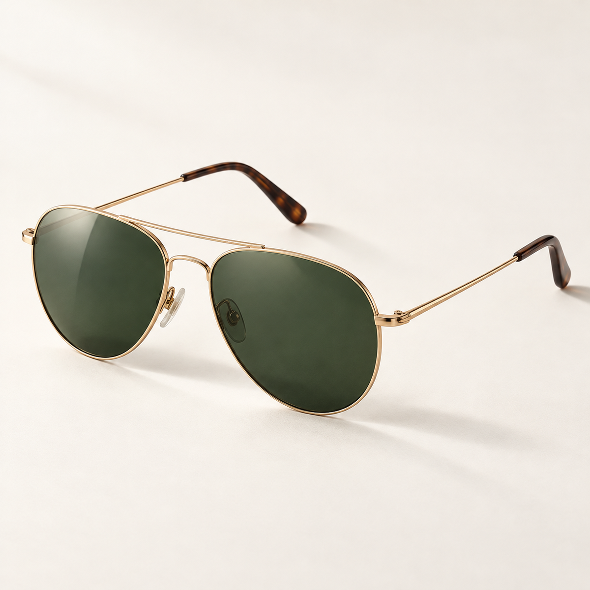 Shadevera Solace Aviator sunglasses, warm gold frame and forest green lenses, hero view